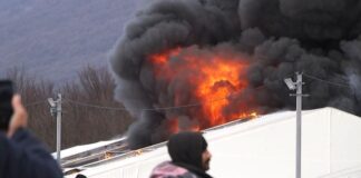 Refugee Camp in Bosnia was on Fire, Black Smoke Soared refugee camp on fire in bosnia