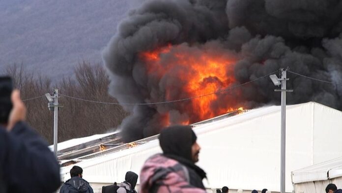 refugee camp on fire in bosnia